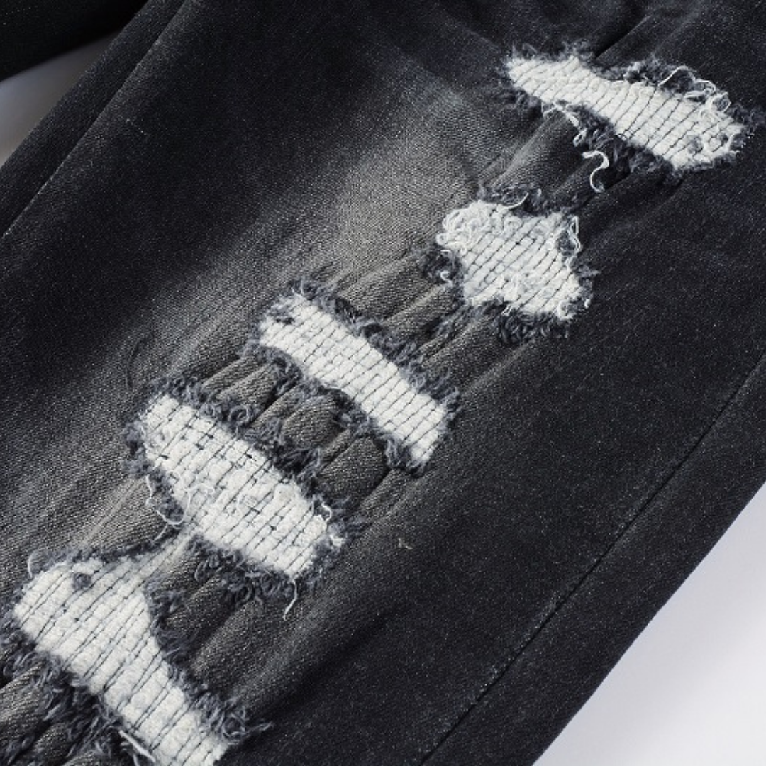 Amiri Logo Distressed Schwarze Jeans – Stylische Designer Denim für Herren