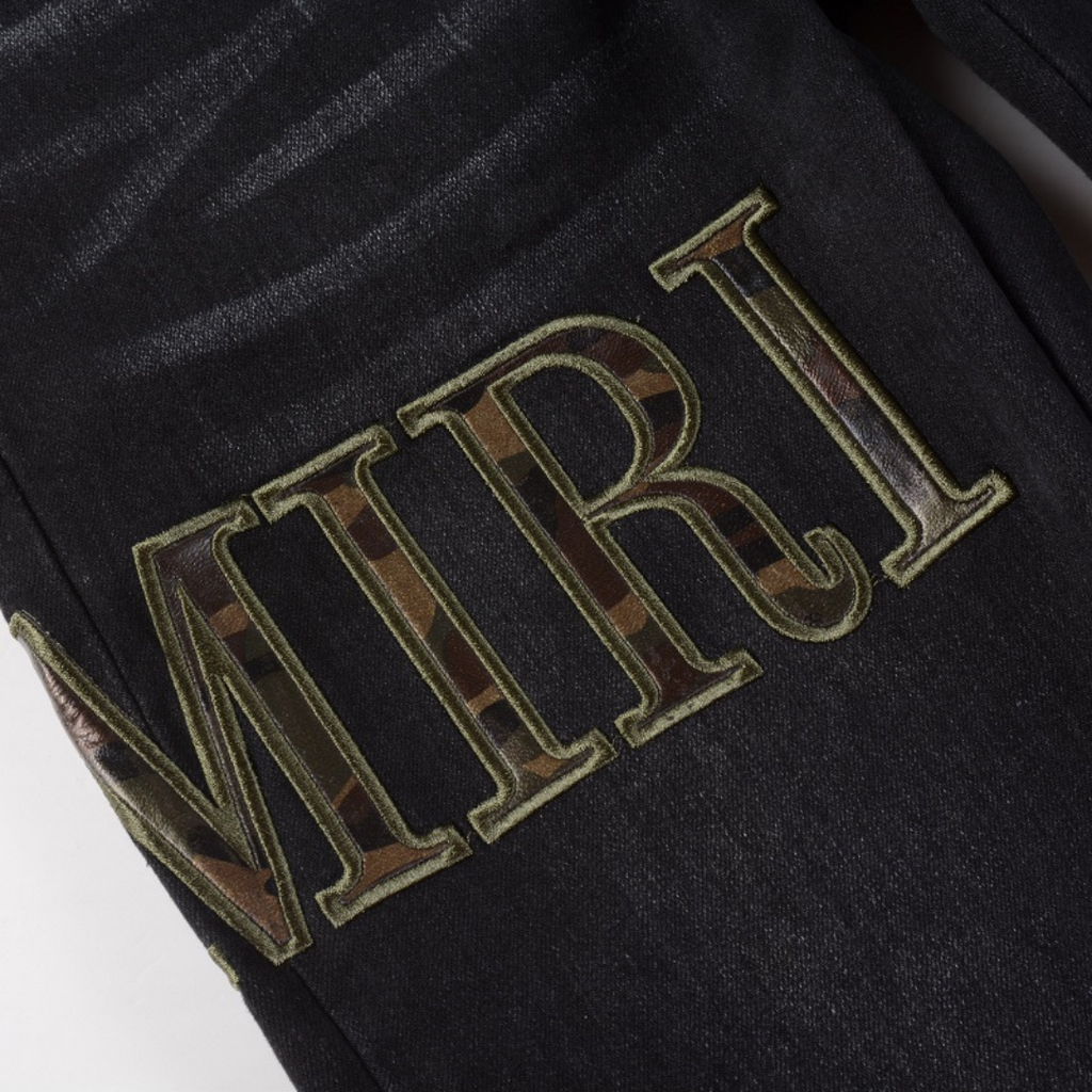 Amiri Luxus Denim Jeans: Auffällige Patches, Risse, Slim Fit Designer Stil