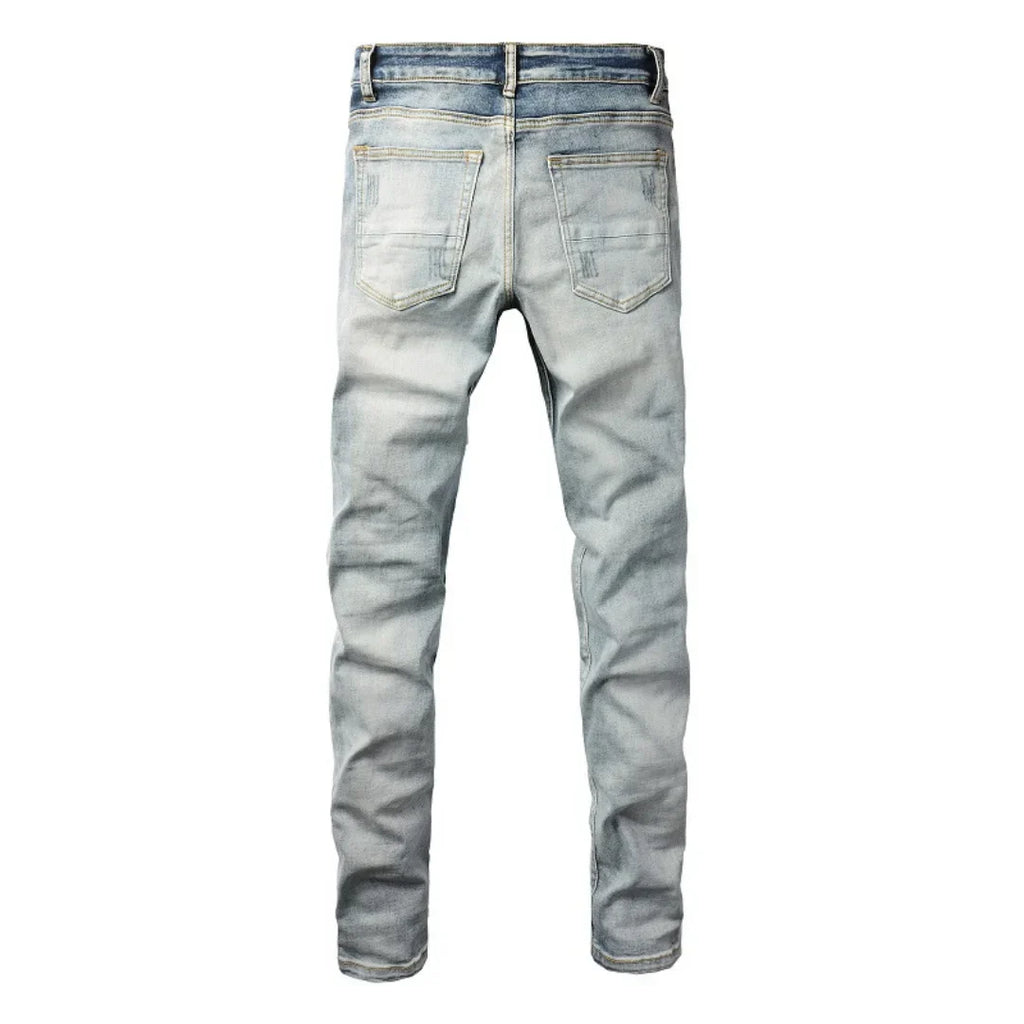 Amiri Blaue Patch Jeans Luxus Designer Denim Slim Fit Destroyed Look