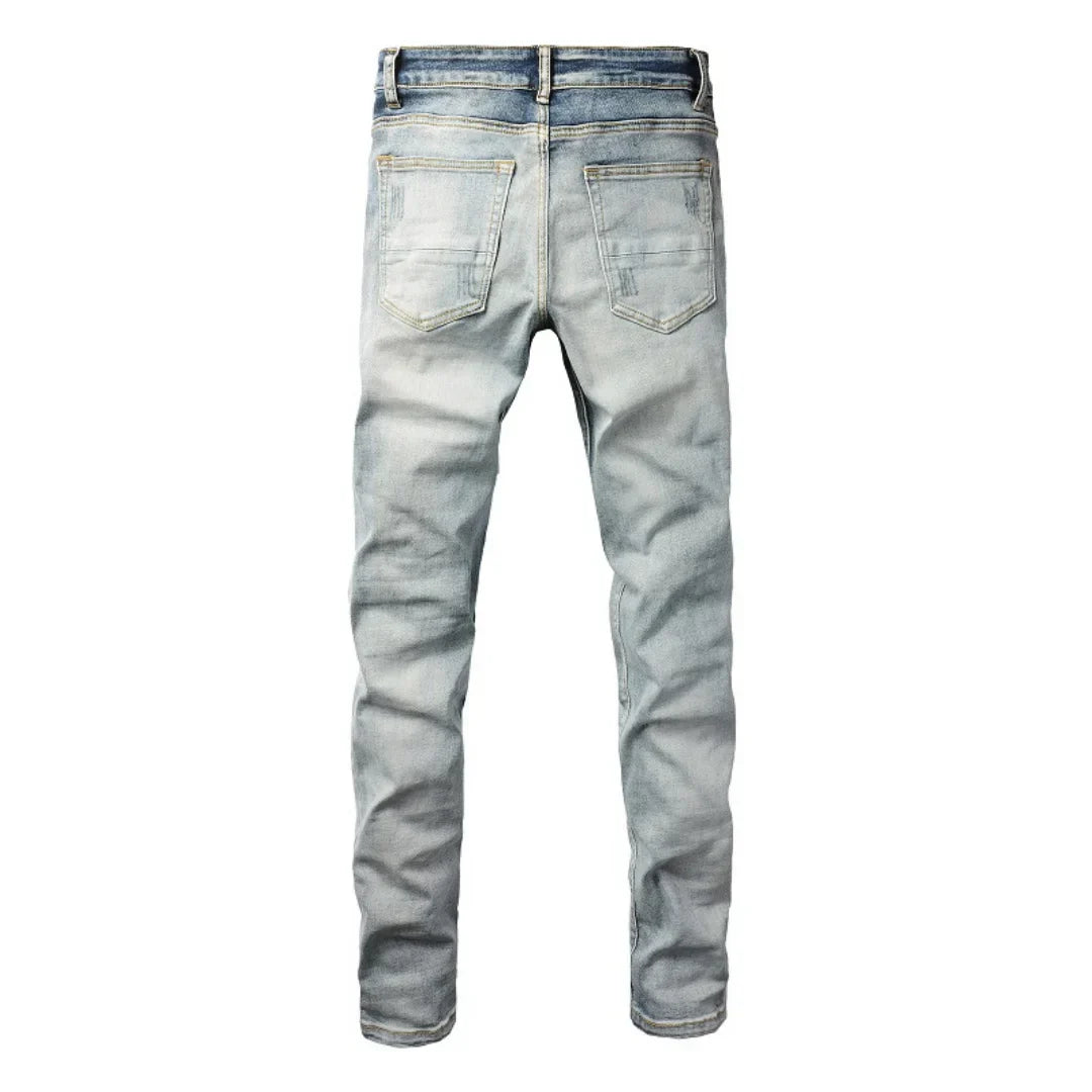Amiri Blaue Patch Jeans Luxus Designer Denim Slim Fit Destroyed Look