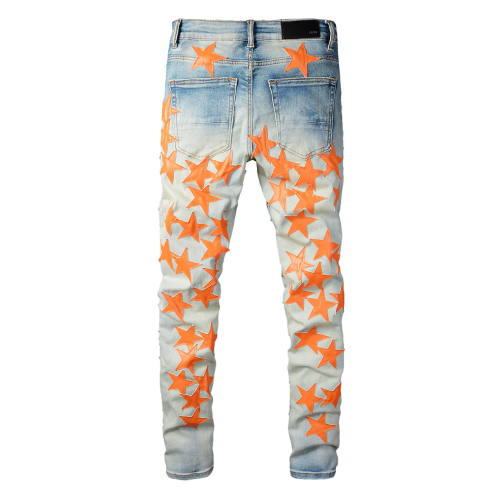 Amiri Slim Fit Designer Jeans mit Orangefarbenen Stern-Patches für Herren