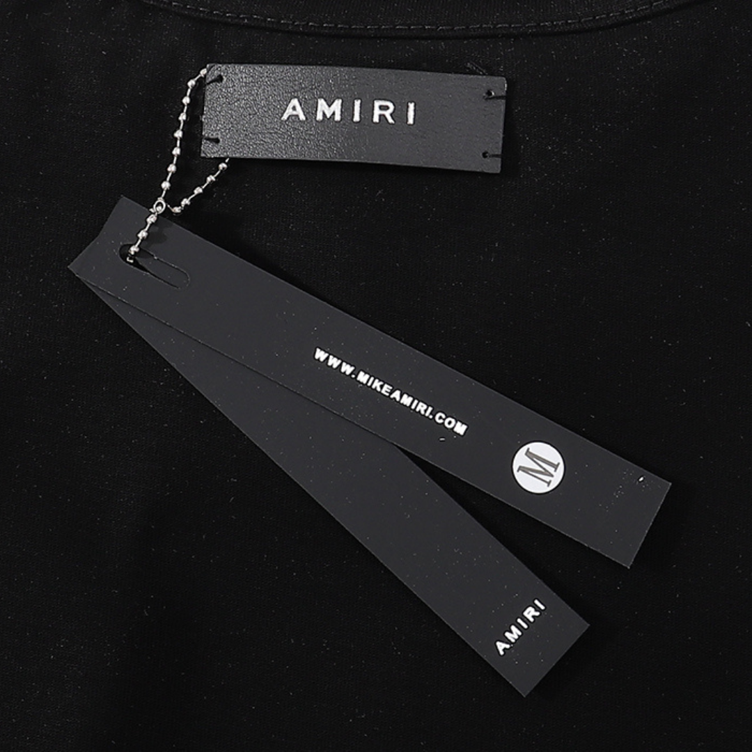 Amiri Staggered Logo T-Shirt: Luxuriöses Baumwoll-Shirt für Herren, Freizeit-Look