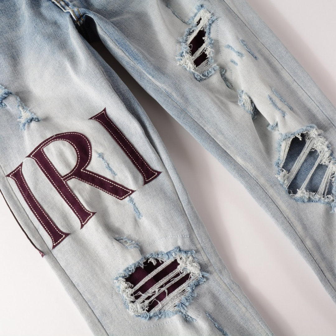 Amiri Logo Distressed Jeans Herren – Stylische Ripped Denim mit Markenlogo