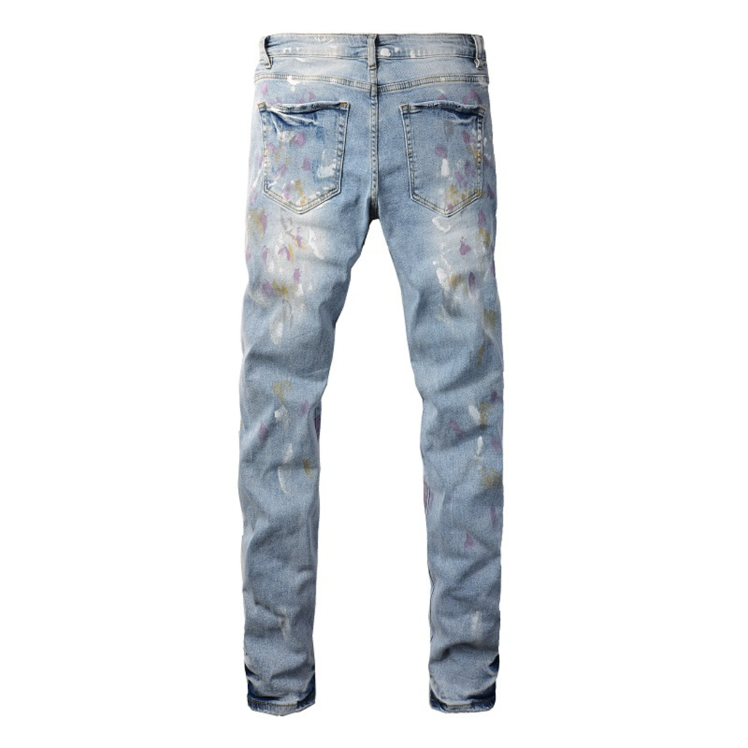Amiri Herren Designer Jeans mit Farbspritzern – Stylische Blaue Denim Hose