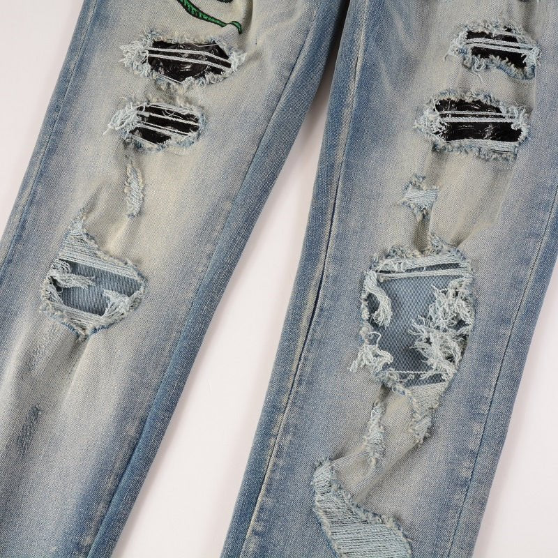 Amiri Luxus Slim Fit Snake Applikations Blue Jeans für Herren – Stylischer Denim