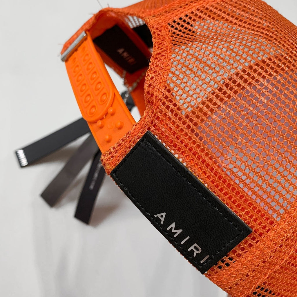 Luxuriöse Amiri Cap Orange-Schwarz mit Logo-Stickerei – Exklusives Streetwear Accessoire